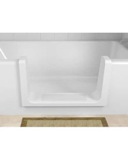 The ORCA TubCut converts your standard tub into a walk-in shower with a wide step-in opening, shown here in white against a tiled wall with a beige mat in front.