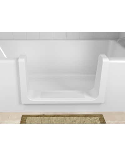 The ORCA TubCut converts your standard tub into a walk-in shower with a wide step-in opening, shown here in white against a tiled wall with a beige mat in front.