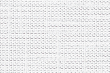Close-up of a white textured surface with a repeating geometric pattern of small raised squares and rectangles, like those found on staph CHEK® VH/C Privacy Curtains.